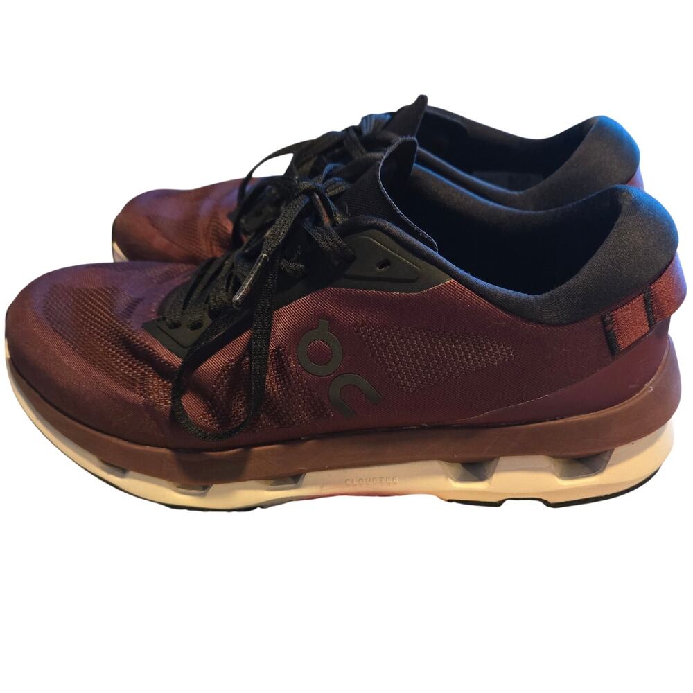 On Women's Cloudzone shoes in the Mulberry and Black colorway.